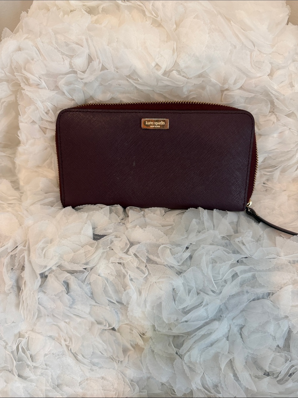 kate spade plum zip-around saffiano wallet with gold plaque